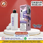 OXBAR Maglink 50K Pod System – 5% Nicotine and its retail packaging in Sakura Grape flavor, displayed on a white pedestal against a red background with promotional text and logos.