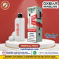 OXBAR Maglink 50K Pod System – 5% Nicotine in Tropical Fruit flavor, shown next to its retail packaging box on a white pedestal against a red background, with multiple promotional text overlays and brand logos.